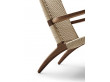 Fauteuil scandinave modèle CH25 en chêne fumé. Nouvelle édition.